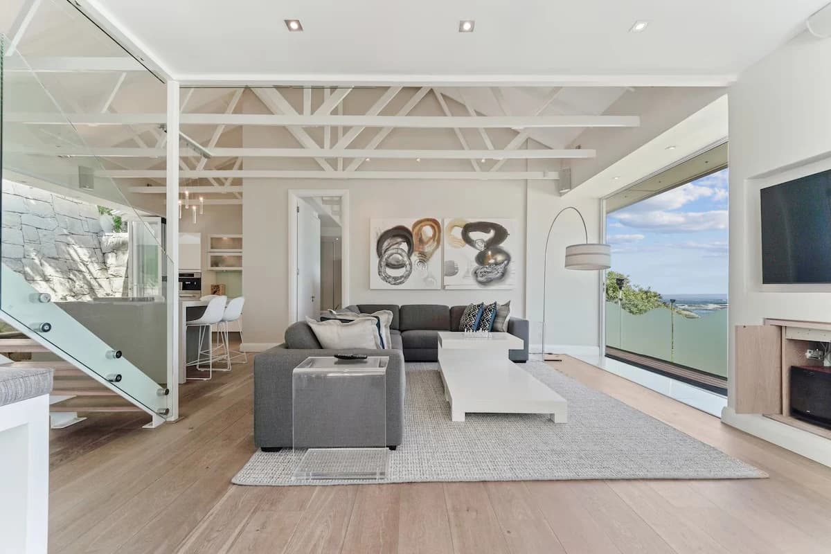 Open-plan living room with Atlantic Ocean views at Bungalow 69